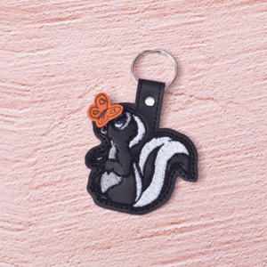 Shy Skunk w/Butterfly Key Fob