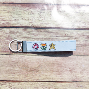 8-bit Plumber Game Wristlet