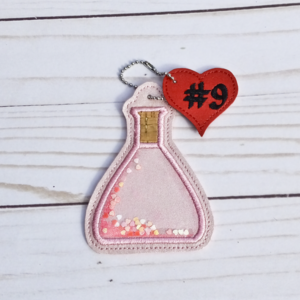 Love Potion #9 Bag Dangle
