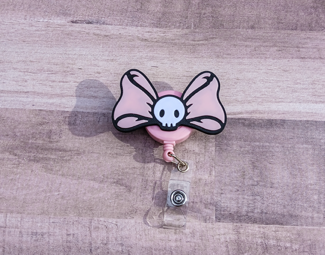 Mischievous Bunny's Bow Badge Reel